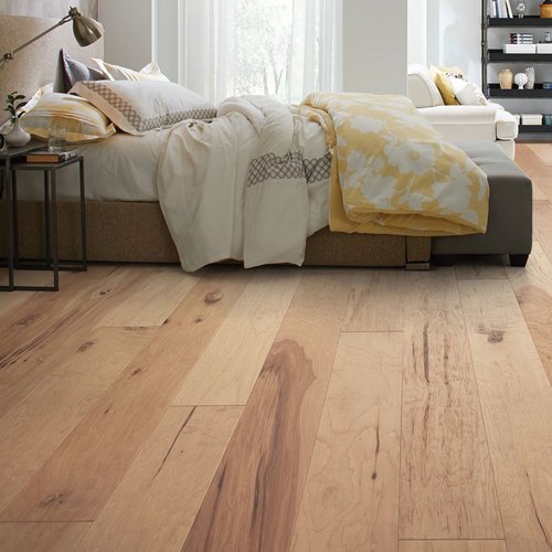 Bedroom with hardwood flooring from Perkins Carpet Co in Conroe, TX