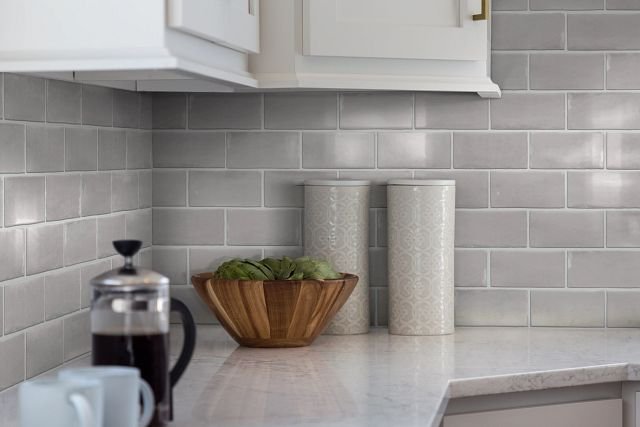 white kitchen counter with tile from Perkins Carpet Co in Conroe, TX